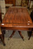 VICTORIAN MAHOGANY PEMBROKE TABLE WITH CROSS BANDED DECORATION, BRASS FEET AND TURNED CENTRAL