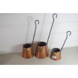 SET OF THREE COPPER CIDER JUGS