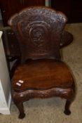 IMPRESSIVE CARVED HARDWOOD HALL CHAIR DECORATED IN CHINESE STYLE WITH A CENTRAL FIGURE OF A DRAGON