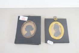 TWO SILHOUETTES IN LEATHER CASES