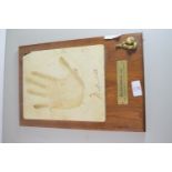 FACSIMILE OF MOHAMMED ALI'S HAND WITH PLAQUE BELOW