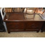 20TH CENTURY OAK BLANKET BOX OF PANELLED CONSTRUCTION WITH CARVED DECORATION, LENGTH APPROX 115CM