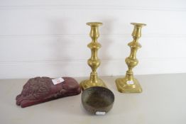 MODEL OF A LION AND TWO BRASS CANDLESTICKS