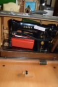 CASED SINGER HAND CRANKED SEWING MACHINE, SERIAL NO EJ660161