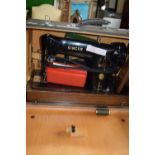 CASED SINGER HAND CRANKED SEWING MACHINE, SERIAL NO EJ660161