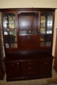 WALL UNIT COMPRISING SIDEBOARD WITH DISPLAY CABINET AND COCKTAIL CABINET ABOVE, WIDTH APPROX 125CM