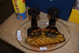 OVAL GLASS TRAY, PAIR OF BLACK GLASS CANDLESTICKS WITH FACETED STEMS