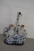 CARRIER WITH TWO POTTERY BOTTLES AND STOPPERS