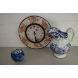 WALL CLOCK WITH BLUE AND WHITE JUG AND FURTHER SMALL JAR WITH PRUNUS DECORATION