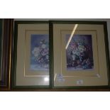 PAIR OF PRINTS OF FLOWERS IN BASKETS IN GREEN WOODEN FRAMES