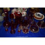 CRANBERRY GLASS WARES, JUGS, VASES AND SMALL BASKETS