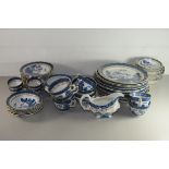 QUANTITY OF BOOTHS OLD REAL WILLOW DINNER AND TEA WARES COMPRISING DINNER PLATES, SIDE PLATES, SIX