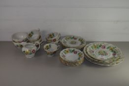 BOOTHS TEA WARES IN THE VICTORIA PATTERN COMPRISING PLATES, CUPS AND SAUCERS