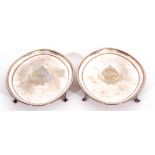 pair of antique silver-plated teapot stands of oval form, beaded borders,
