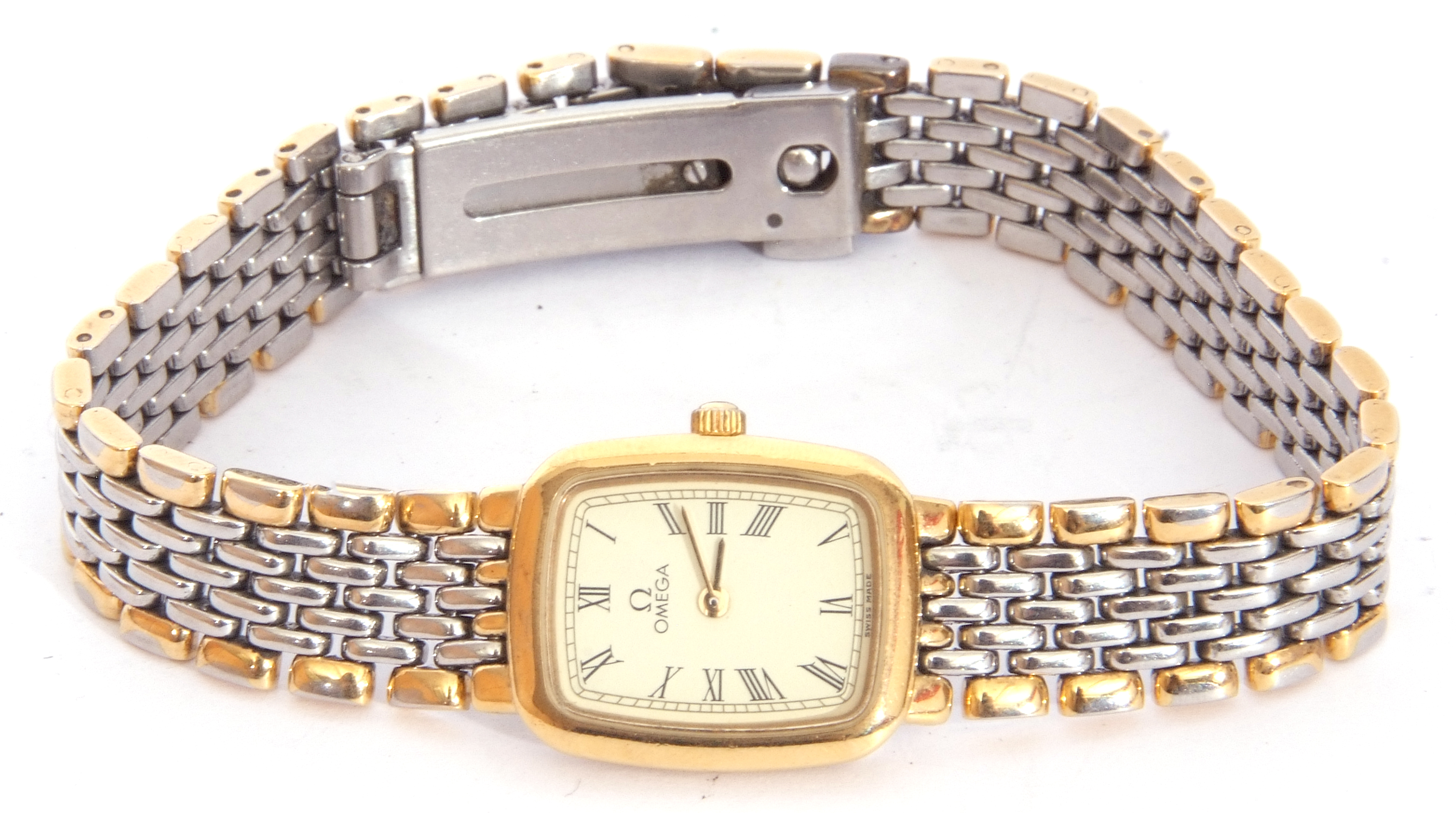 Ladies Omega De ville quartz wrist watch, circa 1980s, of rectangular shape with Roman numerals on a