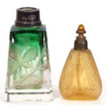 Early 20th century glass perfume bottle of tapering rectangular form, the body intaglio cut with