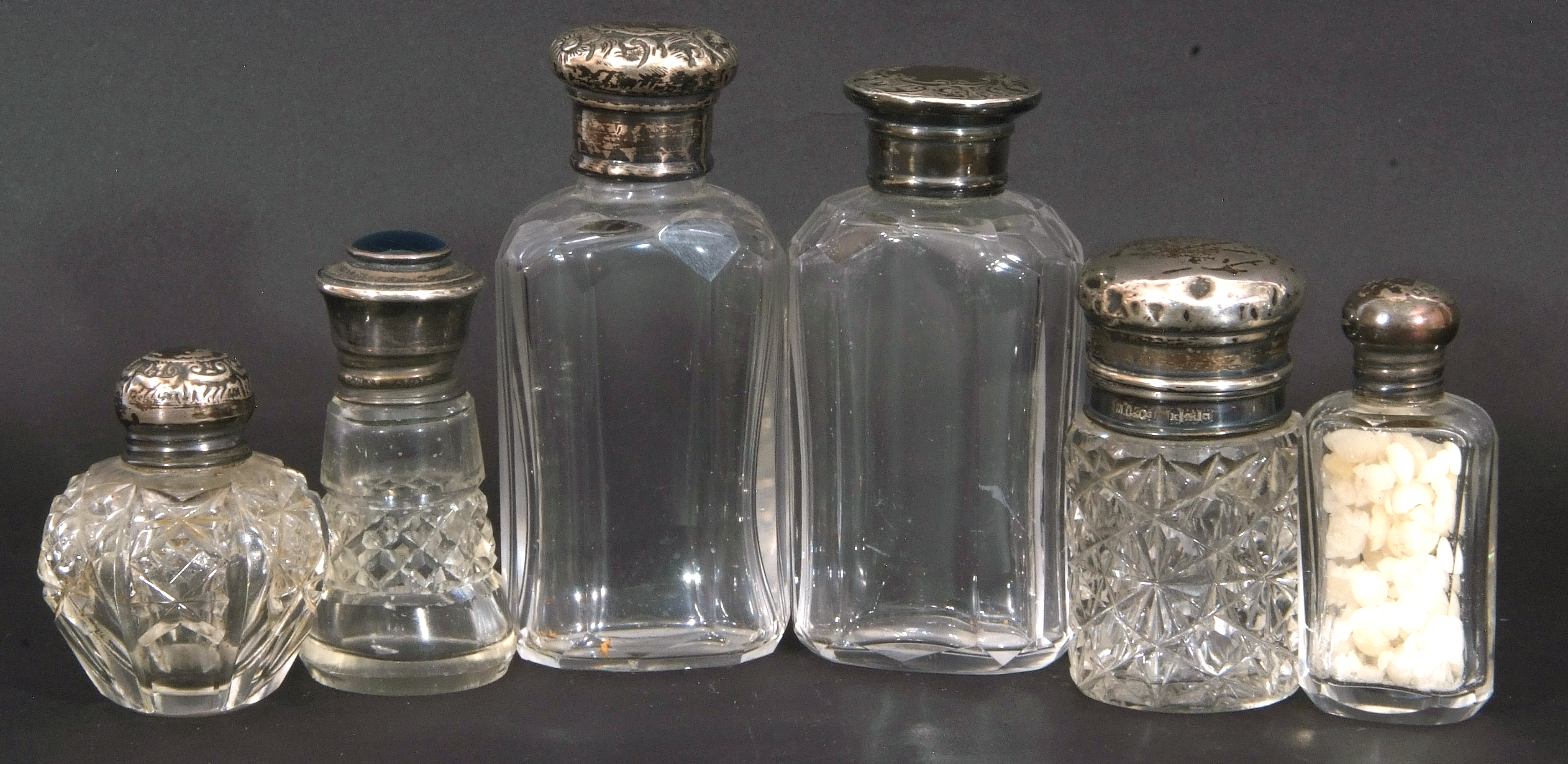 Collection of six glass scent bottles/jars, three with hallmarked silver screw on lids, one silver - Image 2 of 4