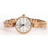 Ladies 9ct gold Rotary wrist watch, the circular silver coloured dial with blued steel hands, Arabic