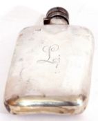 Early 20th century silver hip flask, circa 1920, of rectangular curved form with rounded corners,