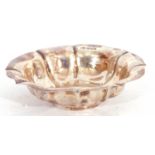 George V silver small shallow bowl of circular form with wavy rim and a fluted design, Sheffield