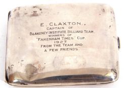 George V silver cigarette case of shaped rectangular form, engraved "E Claxton, Captain of