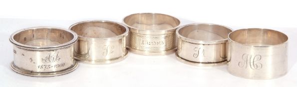 Mixed Lot: 5 serviette rings, 3 hallmarked silver, together with two white metal examples, g/w