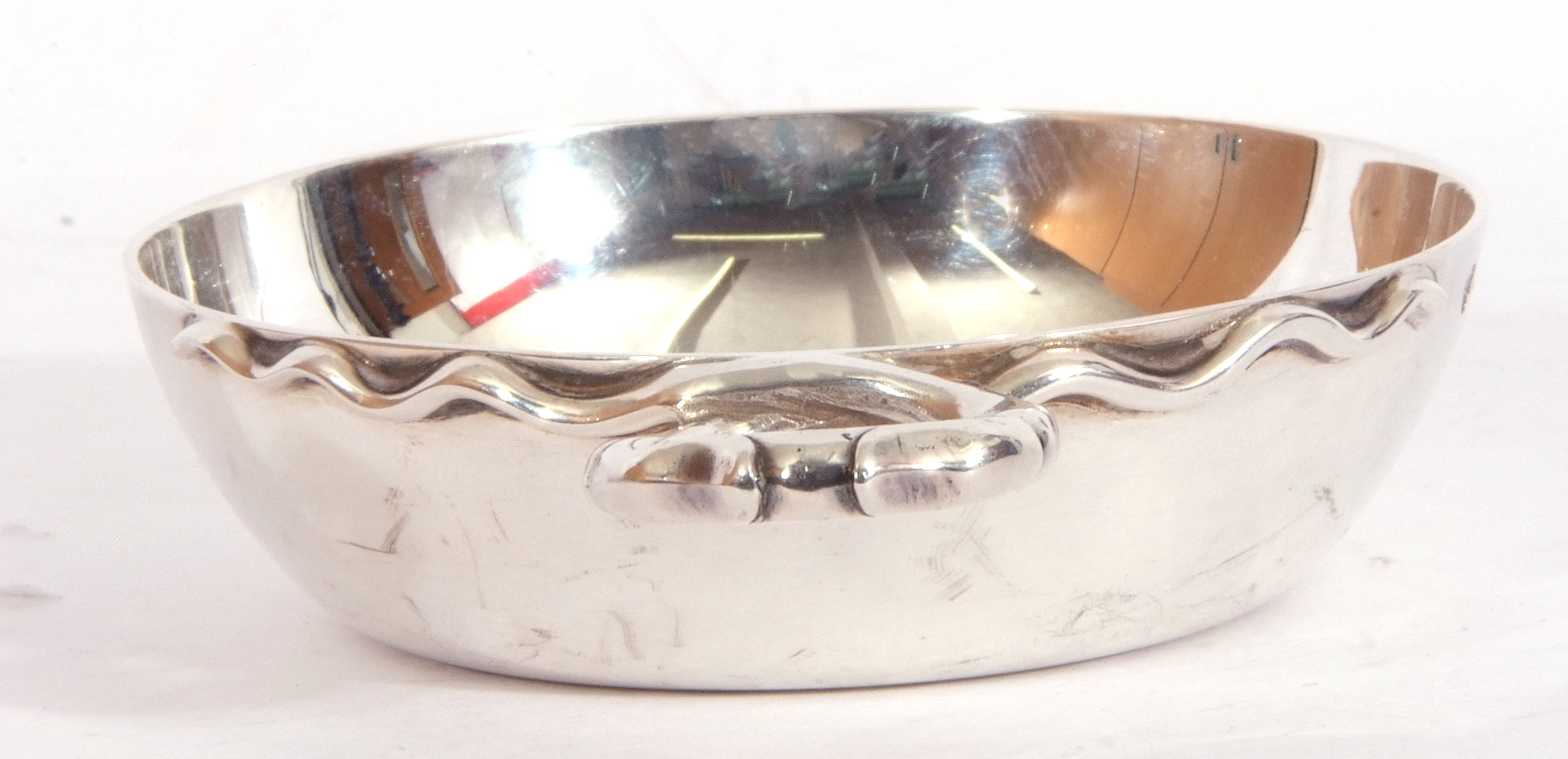 Elizabeth II solid silver wine taster, the round bowl applied with a coiled snake loop handle, 9cm - Image 3 of 4