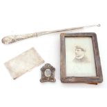 Mixed Lot: large Victorian handled button hook, London 1888, a silver photograph frame, Birmingham