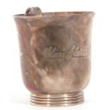 Hallmarked silver small mug, baluster form with reeded handle and foot, engraved "Clare Elaine", 7cm