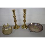 TWO BRASS CANDLESTICKS AND TWO METAL DISHES