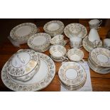 DINNER AND TEA WARES BY COALPORT IN THE ALLEGRO PATTERN COMPRISING TUREEN AND COVER, SERVING DISHES,