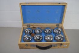 WOODEN SET OF PETANQUE BOWLS