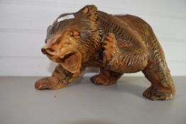 LARGE CARVED MODEL OF A BEAR