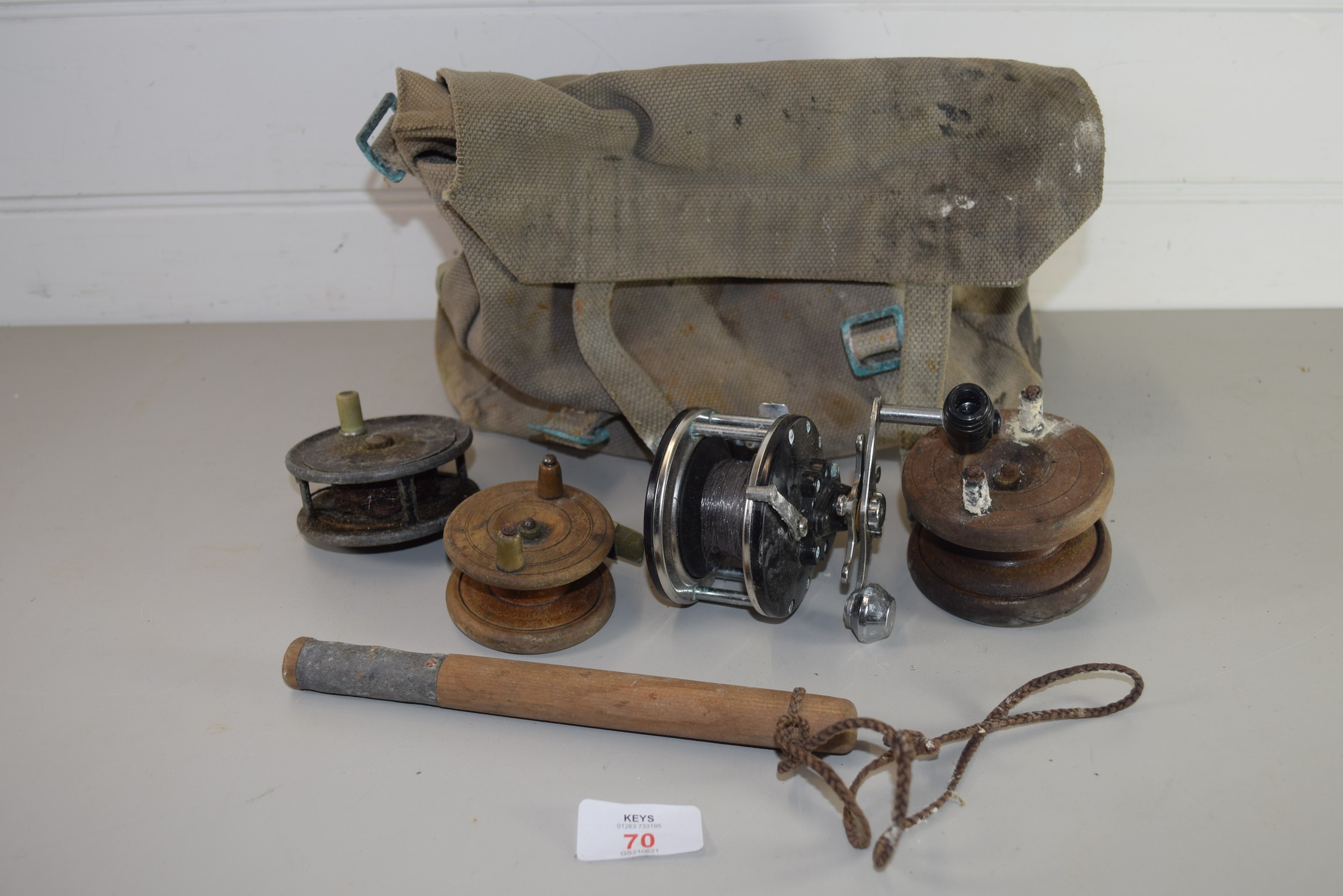 BOX CONTAINING FISHING REELS