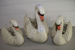 THREE POSY FLOWER HOLDERS MODELLED AS SWANS