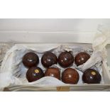 BOX CONTAINING SMALL WOODEN BOWLS