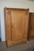 STAINED WOOD SINGLE WARDROBE WITH DRAWER BENEATH AND CARVED DECORATION, WIDTH APPROX 107CM