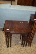 NEST OF THREE REPRODUCTION MAHOGANY EFFECT TABLES, LARGEST APPROX 50 X 37CM