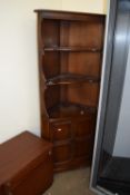 LIGHT OAK CORNER CABINET WITH THREE SHELVES