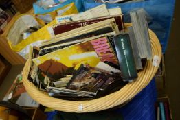 BASKET CONTAINING DVDS AND LPS, MAINLY POP MUSIC