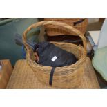 WICKER BASKET CONTAINING FABRICS