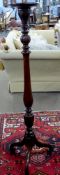 Edwardian mahogany torchere with ring turned and carved decoration, height approx 138cm