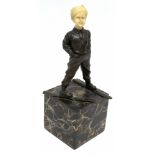 Reproduction Art Deco figure of a skier on onyx or marble base, the head modelled in resin, 30cm