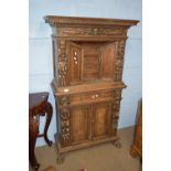 Heavily decorated court cupboard, approx 93cm