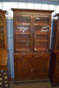 Early 20th century mahogany side cabinet with glazed bookcase above, width approx 104cm max