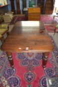 Early/mid Victorian small extending dining table of rectangular shape with rounded corners, raised