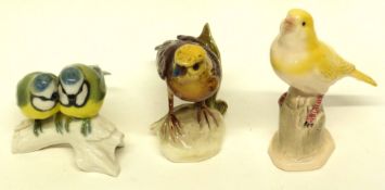 Group of three porcelain models of birds, including a Goebel model of a yellowhammer, and pair of