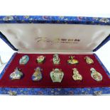 Collection of miniature cloisonne bottles or vases in original box (10)