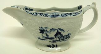 Large Lowestoft porcelain sauce boat, the body with an impressed design of flowers enclosing