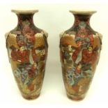 Pair of Japanese Satsuma vases decorated in typical fashion with Japanese figures, 40cm high (2)